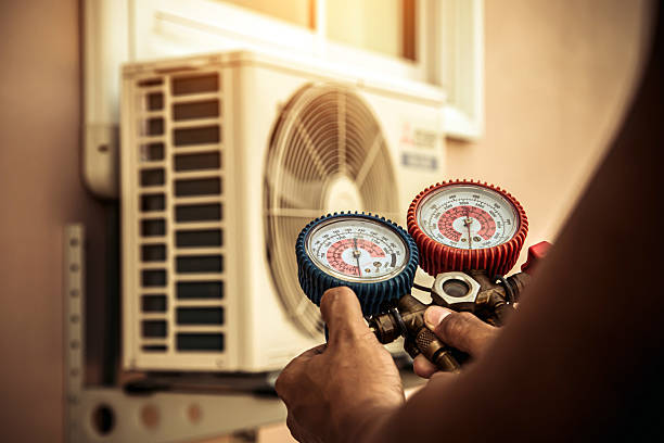 Professional Ac Installation technician working in Lakeville, MA